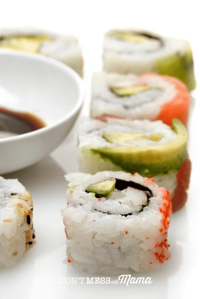 sushi rolls with bowl of soy sauce